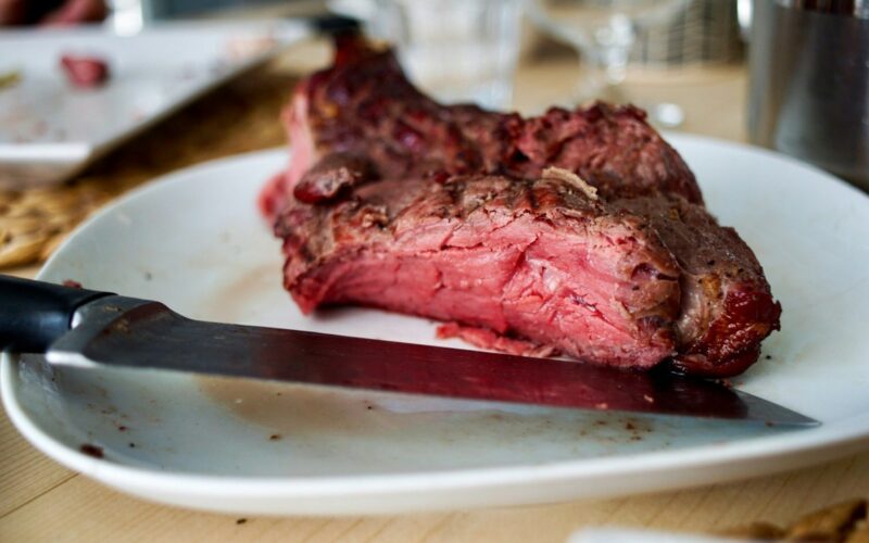 raw meat on white plate