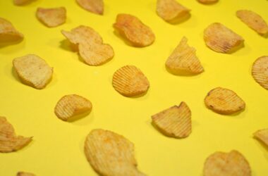 brown cookies on yellow surface