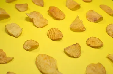 brown cookies on yellow surface