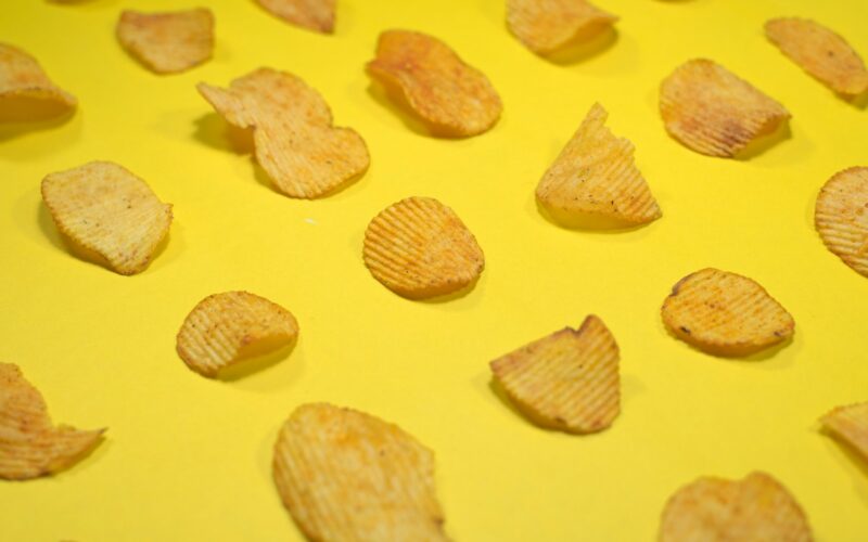 brown cookies on yellow surface