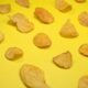 brown cookies on yellow surface