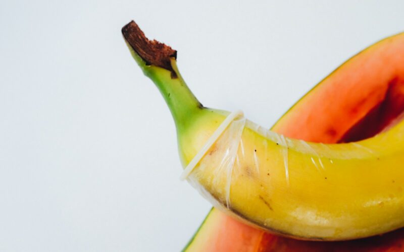 yellow banana fruit on white surface