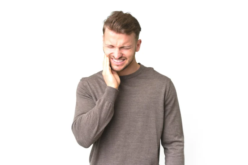 young handsome caucasian man isolated white background with toothachecopy