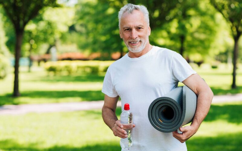 medium shot man with water bottle mat wp
