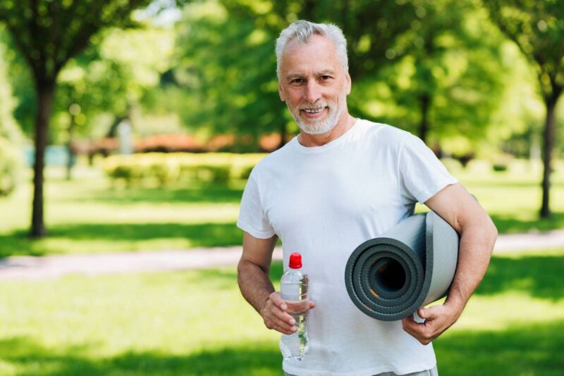 medium shot man with water bottle mat wp